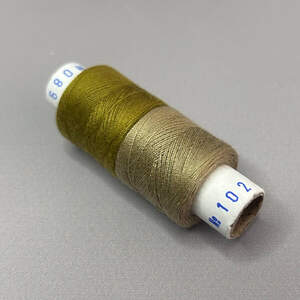 089/102 Нитки в катушках 40/2 , половинки (катушка 2х75м)