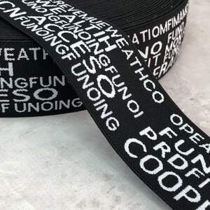 Резинка поясная 3,8 см с надписями - черная с белым Резинка поясная 3,8 см с надписями - черная с белым