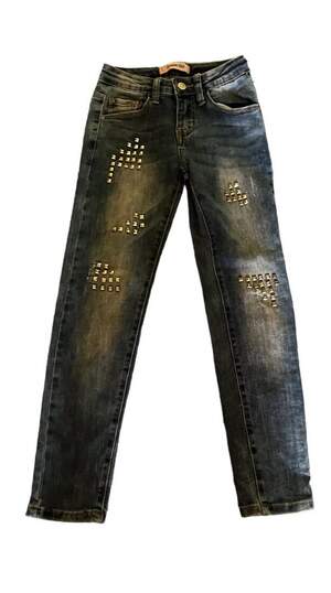 Джинси з прикрасами
