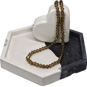 Біконус 4мм коричневий прозорий