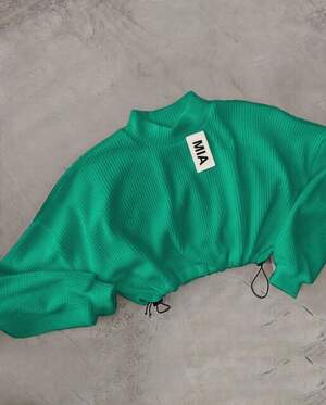 Светр на затяжках