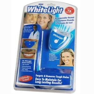 Отбеливание зубов White Light